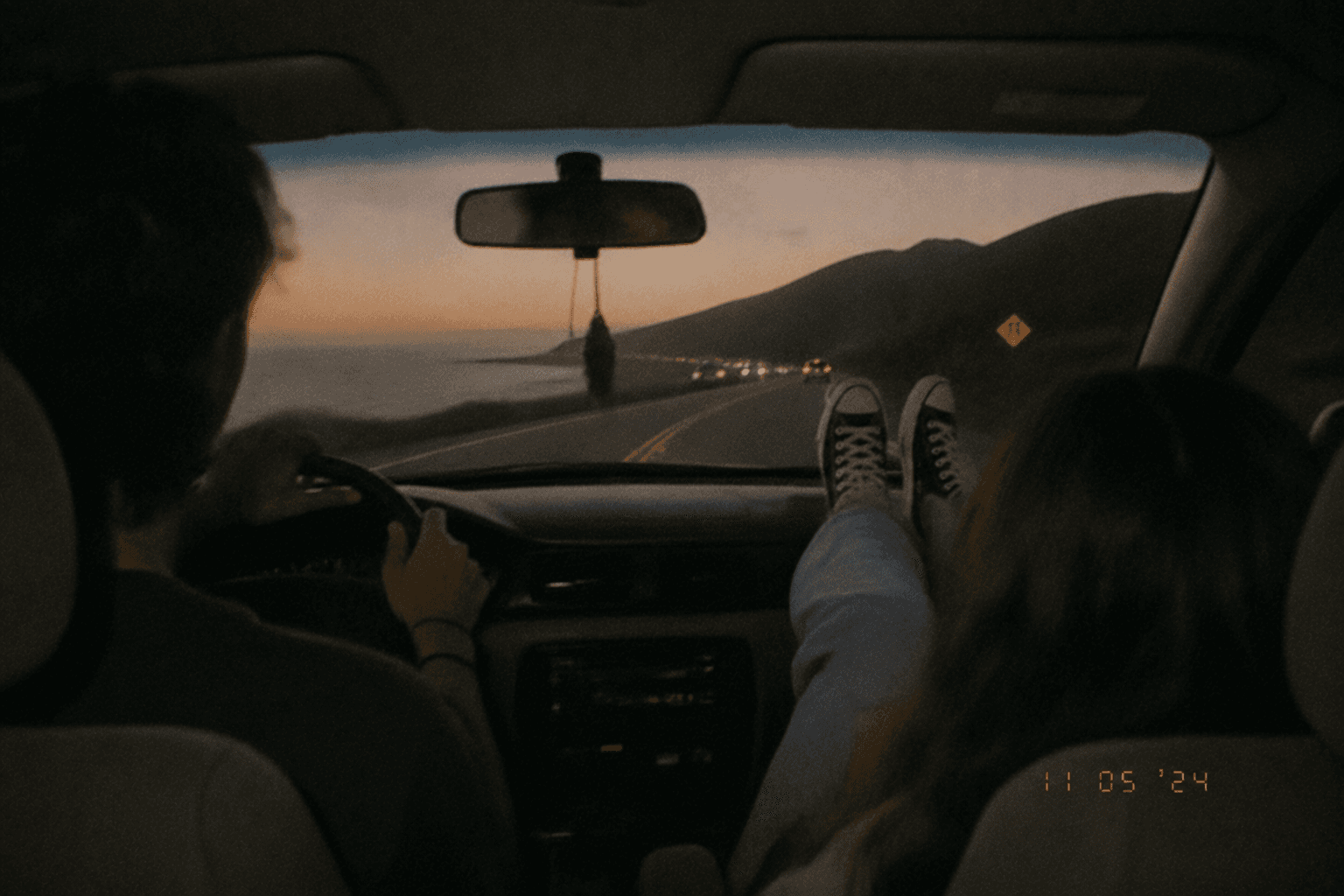 Couple on a sunset road trip