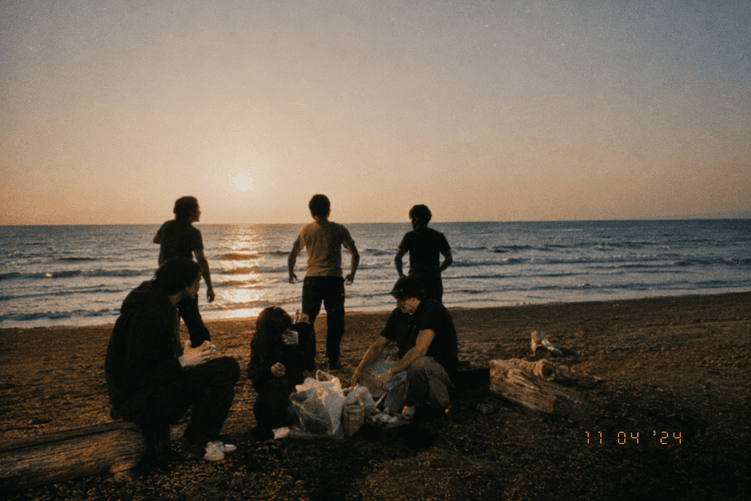 Friends at beach sunset